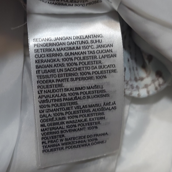 H&M jumpsuit, blue and brown leaf print, cropped length, convertible straps - Picture 12 of 16